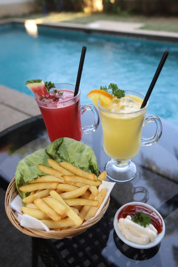 แอมเวอร์ตัน โคฟ กอล์ฟ แอนด์ ไอแลนด์ รีสอร์ต Hotel บันติง ภายนอก รูปภาพ